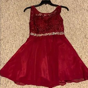 Maroon colored homecoming dress.
